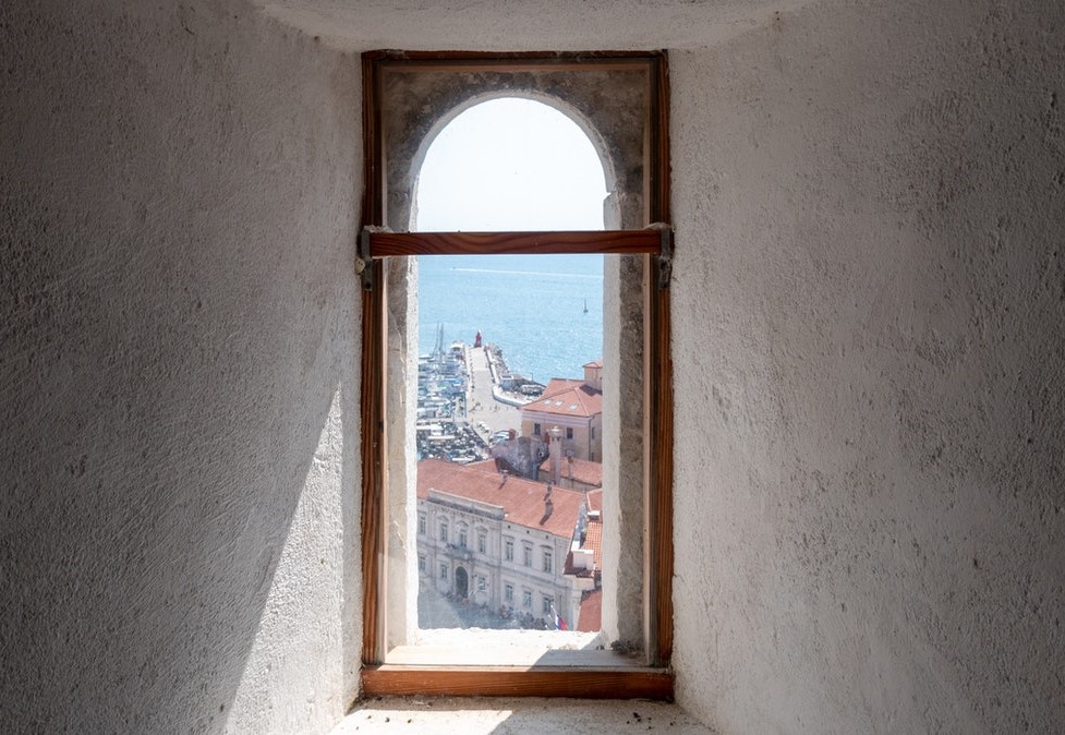image of a window overlooking a town