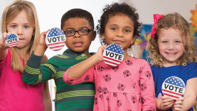 Teaching Tolerance Image of children with voting badges